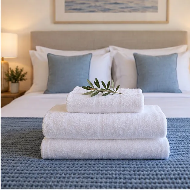 Fresh linen and a prepared bedroom after cleaning